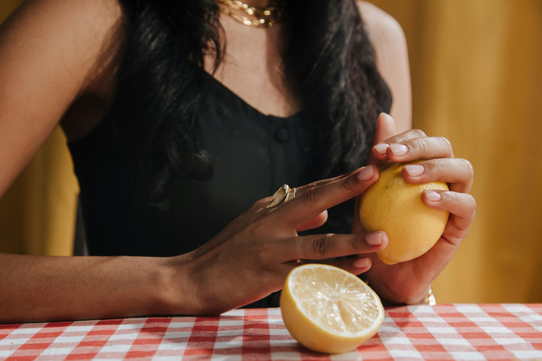 Woman holding vibrators, representing reclaiming pleasure after hysterectomy